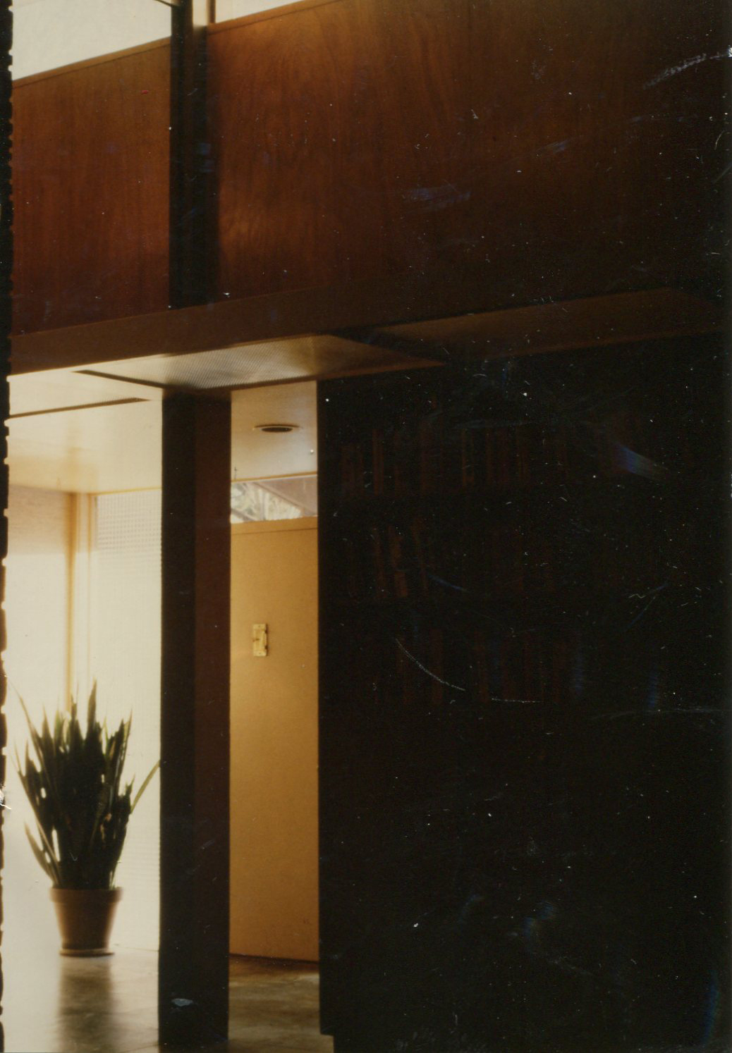 15a. The ceiling in the living room rises to 15 feet. It contains a clerestory, visible at the top of this photograph.