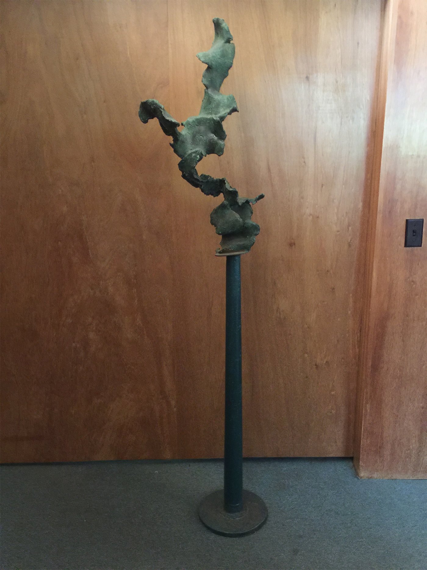 16d. Cast bronze sculpture.
